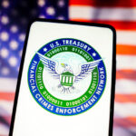 financial crimes enforcement network logo and-USA flag at PCS